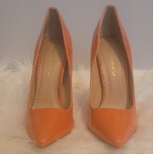 New orange 4 inch pumps size 6 1/2